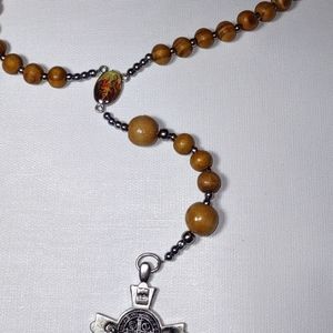 Wood rosary...very solid but light... traditional...blessed
